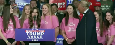 Members of the Roanoke College women's swimming Team appear on stage with former President Donald Trump at a rally in Salem, Virginia, Nov. 2, 2024.