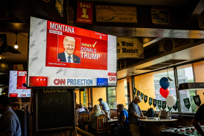 People gather to watch the U.S. election results at a party hosted by Democrats Abroad Thailand at The Roadhouse Barbecue on Nov. 06, 2024, in Bangkok, Thailand.
