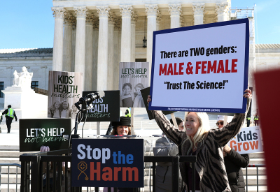 Rep. Marjorie Taylor Greene, R-Ga., attends a rally outside the U.S. Supreme Court as the high court hears arguments in U.S. v. Skrmetti, a case about Tennessee's law banning puberty blockers, cross-sex hormones and body-mutilating sex-changes surgeries for minors suffering from gender dysphoria and whether it violates the Constitution’s equal protection guarantee. 
