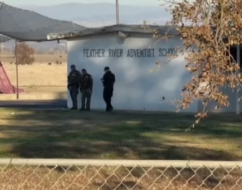 Police officers walk outside of Feather River School of Seventh-Day Adventists in Palermo, California, on Dec. 4, 2024, following a shooting that resulted in two children being wounded and the suspected shooter dying of a self-inflicted gunshot wound.
