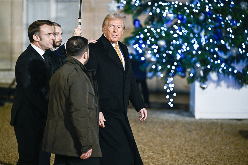 France's President Emmanuel Macron (L) walks with U.S. President-elect Donald Trump (R) and Ukraine's President Volodymyr Zelensky (2nd R) as they leave after a meeting at The Elysee Presidential Palace in Paris on Dec. 7, 2024. Trump makes his first international trip since his election win, preparing for a day of intense diplomacy before attending the reopening ceremony for the Notre Dame cathedral restored after the April 15, 2019, fire.