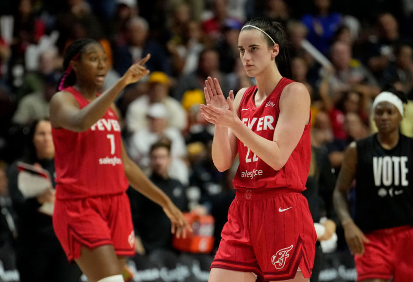 Aliyah Boston #7 and Caitlin Clark #22 of the Indiana Fever react as they play the Connecticut Sun during the fourth quarter of Game 2 of the 2024 WNBA Playoffs first round at Mohegan Sun Arena on September 25, 2024, in Uncasville, Connecticut.