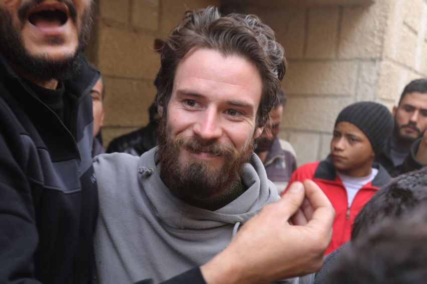 United States citizen Travis Timmerman, who had entered Syria from Lebanon on a Christian pilgrimage and had been detained for several months, speaks with reporters in a house in Damascus on December 12, 2024, after he was found in the village of Thihabiyeh east of the capital, after rebels toppled longtime president Bashar al-Assad.