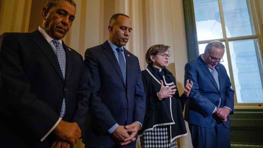 Rep. Adriano Espaillat, D-N.Y., House Minority Leader Hakeem Jeffries, D-N.Y., House Chaplain Margaret Grun Kibben, and Senate Minority Leader Chuck Schumer, D-N.Y., pray at the start of a January 6 commemoration press conference at the U.S. Capitol on Jan. 6, 2025, in Washington, D.C.