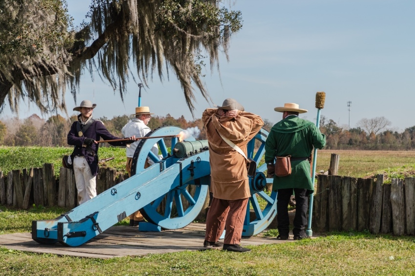 Reenactors fire a cannon over the battlefield after a ceremony marking the 210th anniversary of the 1815 Battle of New Orleans on Jan. 8, 2025.