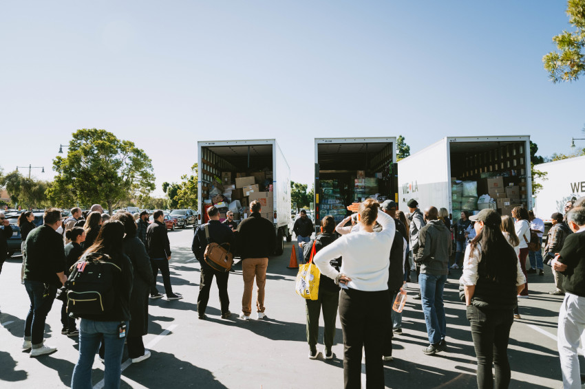 Volunteers gather to distribute food and other resources for LA wildfire victims in January 2024.