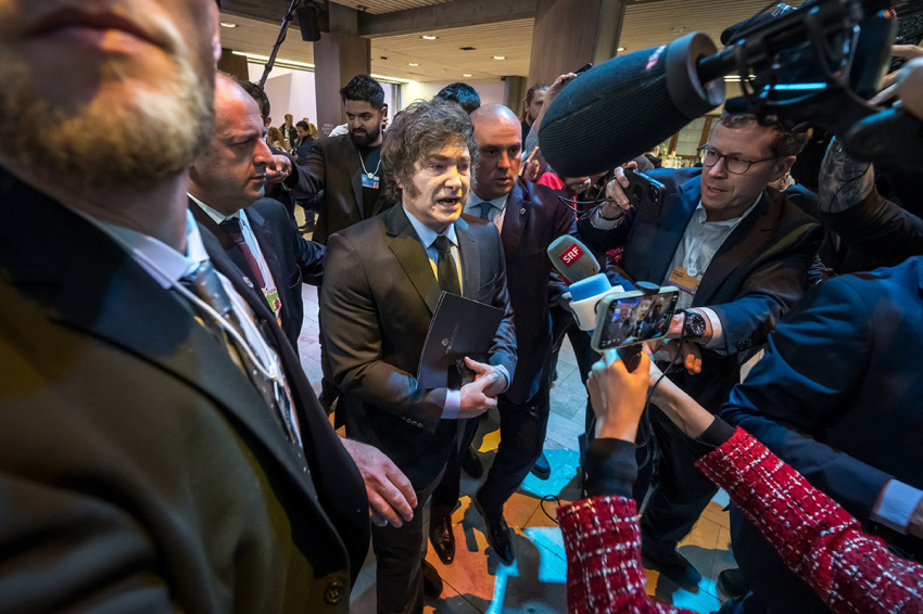 Argentina's President Javier Milei (C) addresses media during the World Economic Forum (WEF) annual meeting in Davos, Switzerland, on Jan. 23, 2025. Milei said at a Bloomberg event on Jan. 22 that