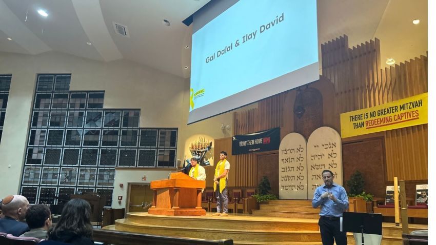 Ilay David (R) and Gal Gilboa-Dalal speak at a prayer event held at the Washington Hebrew Congregation on Feb. 18, 2025, in Washington, D.C.
