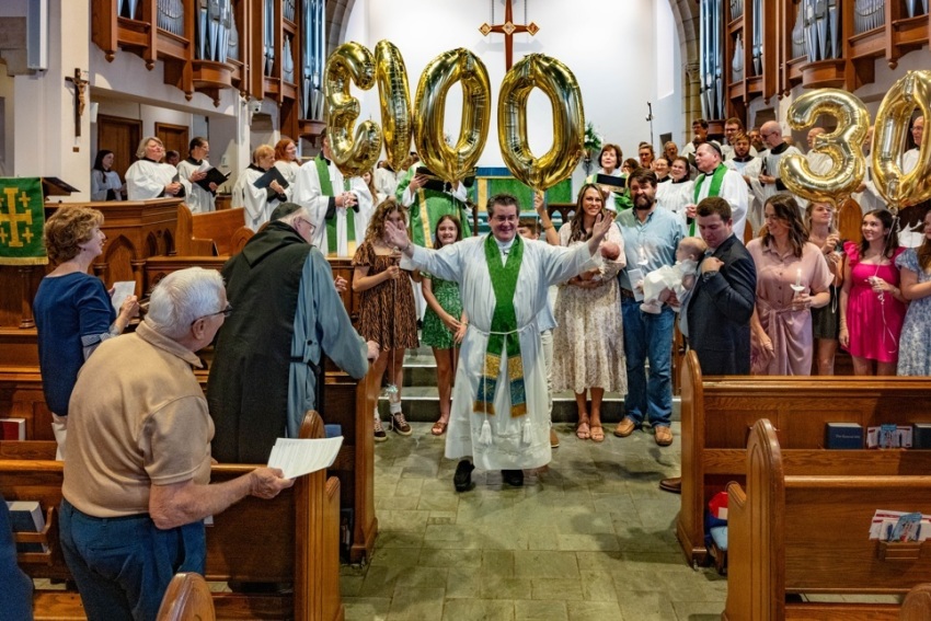 A celebration of the baptism of the 3,000th and 3,001st members of Church of the Redeemer of Sarasota, Florida.