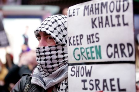 Pro-Palestinian activists participate in a 
