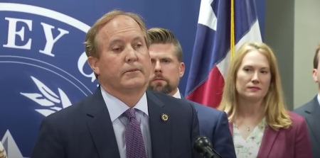 Texas Attorney General Ken Paxton giving a press conference in May 2023.