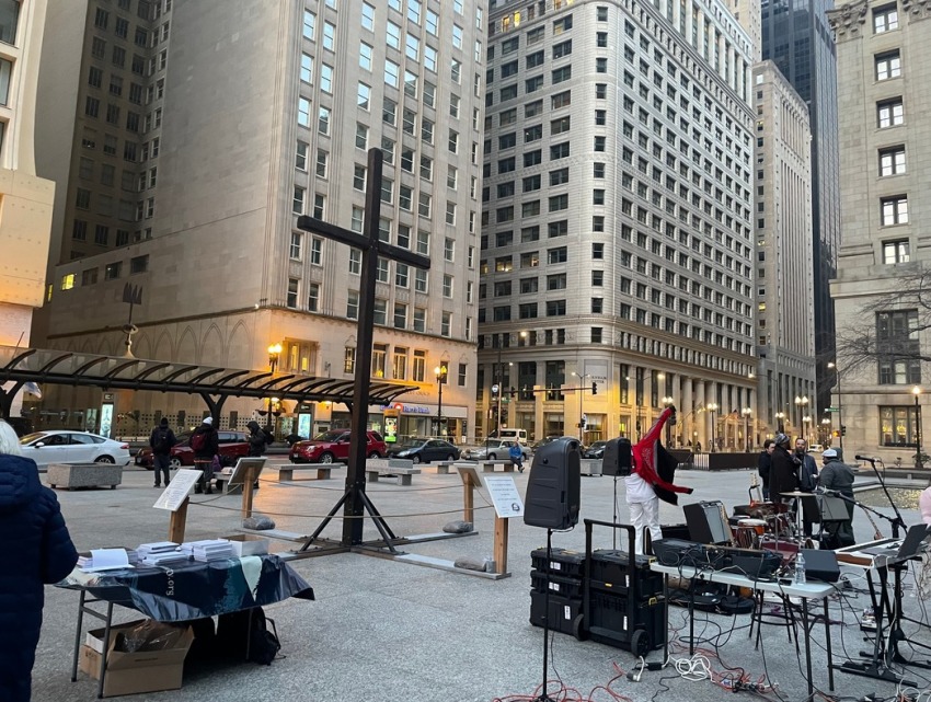 A large wooden cross is set to go up in Chicago's Dealy Plaza.