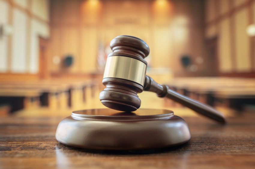 A gavel seen inside a courtroom.