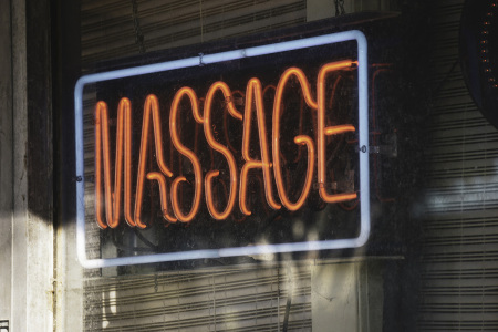 A sign that says "Massage."