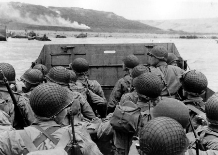 American soldiers in a landing craft approaching Omaha Beach during the landings at Normandy, France on "D-Day", June 6, 1944.