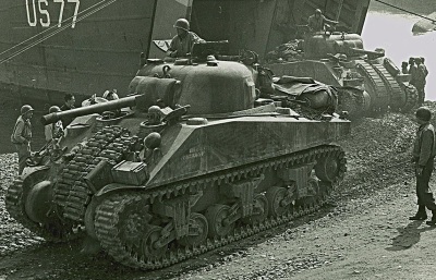American tanks disembark at Anzio harbor in Italy, as part of Operation Shingle during World War II.