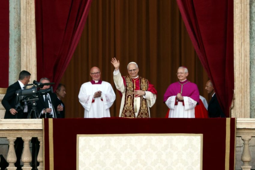 The newly elected Pontiff, Pope Leo XIV is seen for the first time from the Vatican balcony on May 8, 2025 in Vatican City, Vatican.