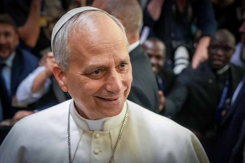 Pope Leo XIV shakes the hands and greets people of the press after an audience with thousands of journalists and media workers on May 12, 2025, at Paul VI Hall in Vatican City, Vatican.