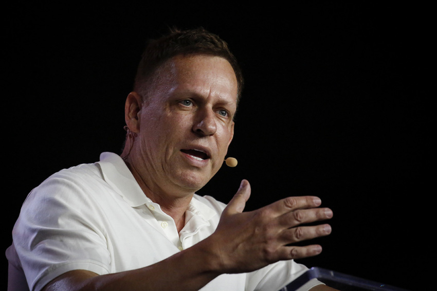 Peter Thiel, co-founder of PayPal, Palantir Technologies, and Founders Fund, gestures as he speaks during the Bitcoin 2022 Conference at Miami Beach Convention Center on April 7, 2022, in Miami, Florida. 