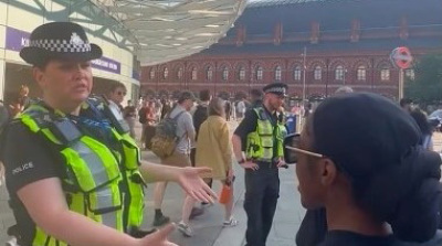 A British officer was filmed confronting evangelists