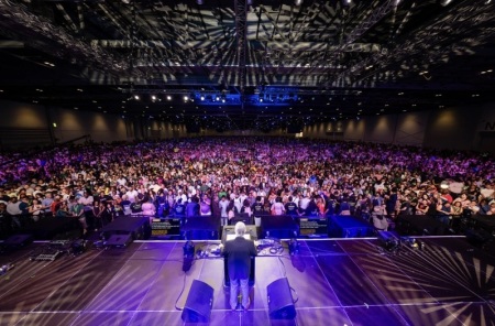 Franklin Graham speaks to a full-capacity crowd at ExCeL London during the God Loves You Tour, sharing a message of hope in Jesus Christ.