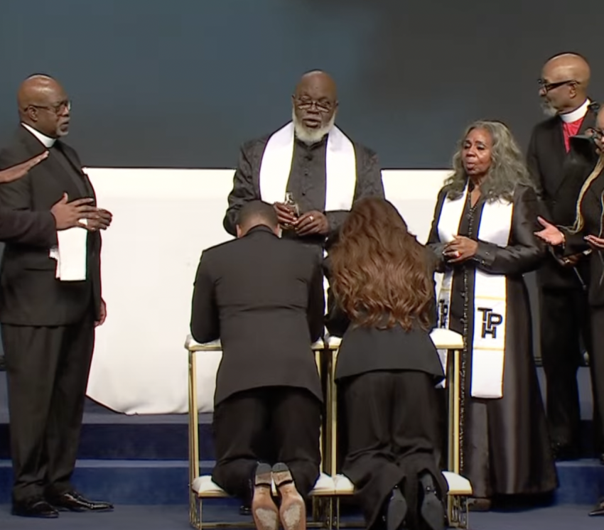 Bishop TD Jakes and his wife, Sereta Jakes, stand in front of their daughter, Sarah Jakes, and her husband, Touré Roberts, during a leadership handover ceremony at The Potter's House on July 6, 2025. 