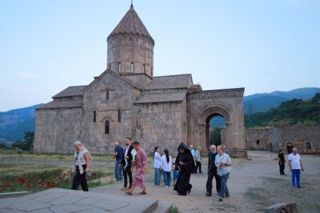 A group of Christian leaders and advocates from the United States walk outside the Tatev Monastery, a ninth-century Armenian Apostolic monastery near the village of Tatev in the Syunik Province in southeastern Armenia on July 31, 2025.