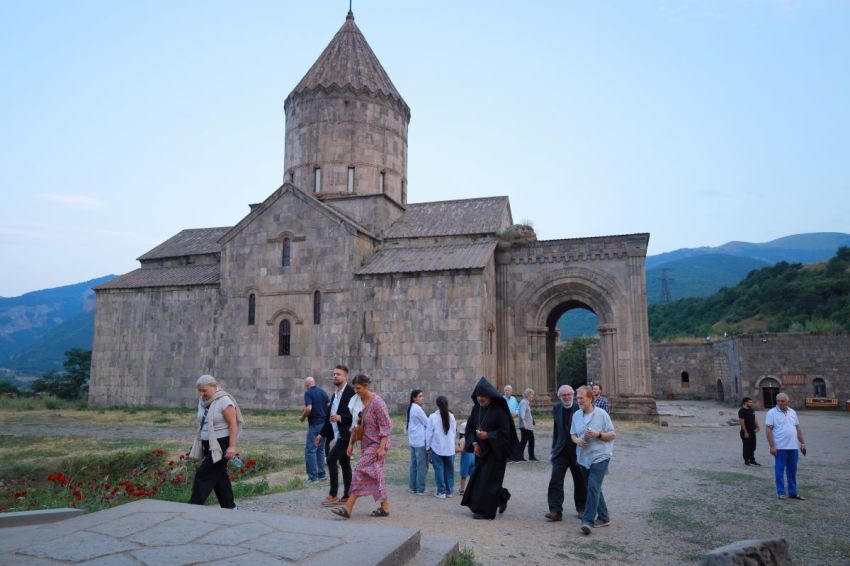 A group of Christian leaders and advocates from the United States walk outside the Tatev Monastery, a ninth-century Armenian Apostolic monastery near the village of Tatev in the Syunik Province in southeastern Armenia on July 31, 2025.