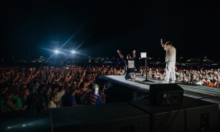 Around 45,000 people attend Amplify 2025, an evangelism event held in Benton, Arkansas, on Aug. 8-9, 2025, and hosted by Pulse Evangelism. 