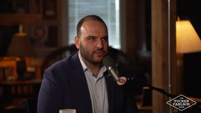 Shahed Ghoreishi, who was fired from the U.S. State Department, being interviewed by Tucker Carlson. The interview was released on multiple platforms on Sept. 5, 2025.