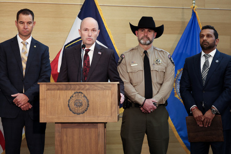 (L-R) Utah Department of Public Safety Beau Mason, FBI director Kash Patel, Utah Gov. Spencer Cox and Sheriff Mike Smith attend a press conference outside the Doterra Auditorium at Utah Valley University after Christian youth activist and influencer Charlie Kirk was shot during a public event in Orem, Utah, on Sept. 12, 2025. U.S. President Donald Trump on Friday announced that the suspect had been taken into custody over the murder of Kirk after a massive manhunt.