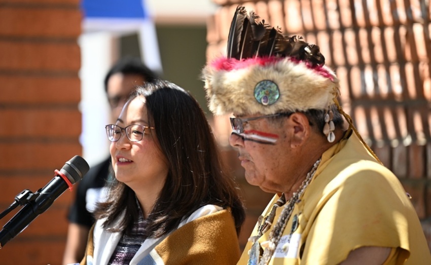 The Rev. Jihyun Oh, stated clerk of the Presbyterian Church (USA), and Chief Anthony Redblood Morales, leader of the Gabrieleno Tongva Tribal Council, participate in a joint benediction at the end of a worship service in August 2025. 