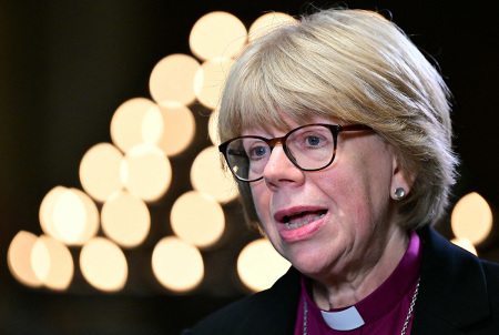 Britain's new Archbishop of Canterbury-designate, Sarah Mullally, speaks during an interview with a television crew at Canterbury Cathedral, southeast England on Oct. 3, 2025, following the announcement of her posting. Sarah Mullally was on Friday named the new Archbishop of Canterbury, the U.K. government announced, becoming the first woman to lead the Church of England in its history. Her nomination by a committee tasked with finding a successor to Justin Welby, who stepped down earlier this year over an abuse scandal, has been approved by King Charles III, the government said.