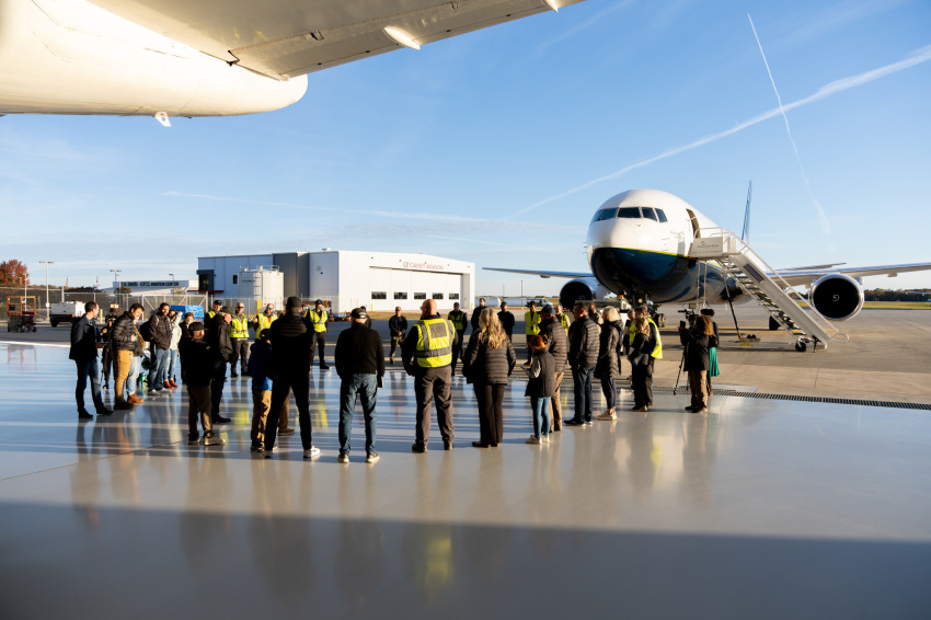 Workers with Samaritan's Purse pray at an airport in Greensboro, North Carolina, during the liftoff of the organization's 13th relief flight to Gaza on Oct. 25, 2025.