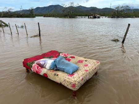 A bed washed away by floods is seen after the passage of Hurricane Melissa through the town of San Miguel de Parada in Santiago de Cuba province on October 29, 2025. A powerful Hurricane Melissa made landfall in eastern Cuba on Wednesday, causing damage and flooding to homes and streets in Santiago de Cuba province, an AFP team on the ground reported.