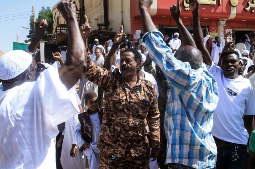 Local residents take part in a demonstration in Omdurman on October 31, 2025, to protest against the Rapid Support Forces' reported