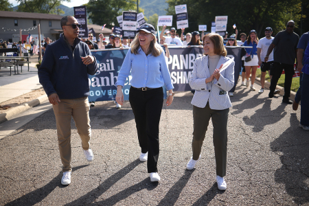 Virginia Democratic gubernatorial candidate, former Rep. Abigail Spanberger (C), marches in the 54th annual Buena Vista Labor Day Festival parade with Democratic Nominee for Lieutenant Governor, Senator Ghazala Hashmi (R), and Democratic Nominee for Attorney General, former state Delegate Jay Jones (L), on Sept. 01, 2025, in Buena Vista, Virginia. The Commonwealth of Virginia will hold its off-year election for governor and other statewide offices on Nov. 4.