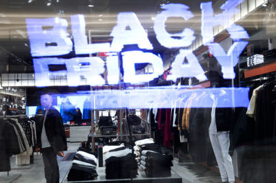 A worker stands inside a store at the American Dream Mall During Black Friday sales on November 29, 2024 in East Rutherford City. Black Friday, is the sales event that is considered the unofficial kickoff of the holiday shopping season and one of the busiest days of the year for retail foot traffic in the U.S.