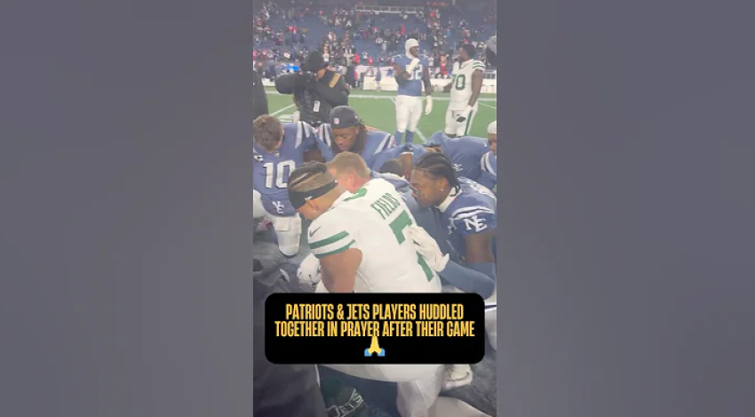 Players from the New England Patriots and the New York Jets kneel in prayer following a game in Gillette Stadium in Foxborough, Massachusetts, on Nov. 13, 2025.