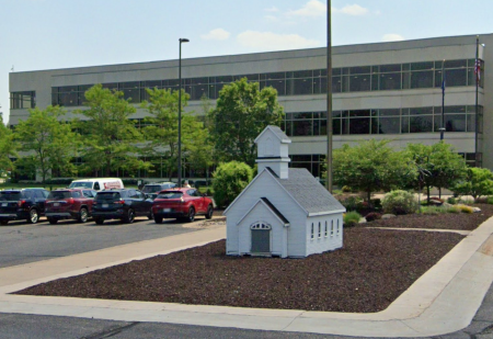 A miniature church building sits on the grounds of the headquarters of Church Mutual Insurance Company in Merrill, Wisconsin.