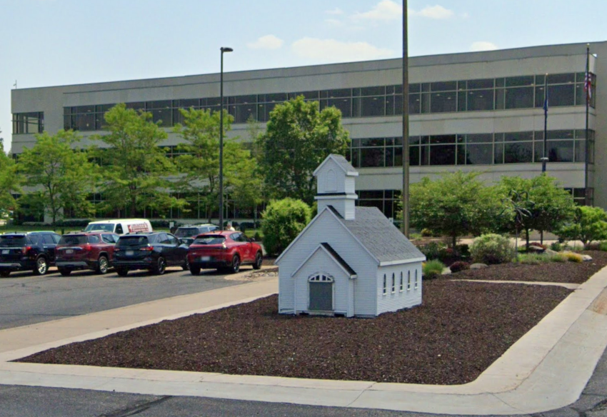 A miniature church building sits on the grounds of the headquarters of Church Mutual Insurance Company in Merrill, Wisconsin.