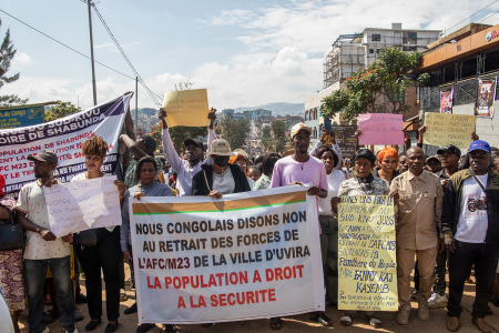Protesters take part in a march organized by civil society groups in South Kivu to demand peace and the organization of a dialogue in Bukavu on Dec. 23, 2025. After seizing the major cities of Goma and Bukavu early this year, fighters from the Rwanda-backed M23 group captured Uvira near the border with Burundi on Dec. 10. Its fall came days after the Congolese and Rwandan leaders signed a peace deal in Washington and the offensive drew sharp condemnation from the United States, which vowed "action" over the "clear violation" of the U.S.-brokered accord. On Dec. 17, 2025, the M23 said it had begun pulling out from the city and called on "mediators and other partners to ensure Uvira is protected from violence, reprisals and remilitarization."