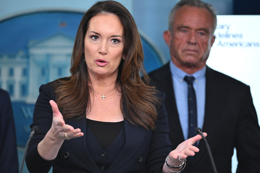 (L/R) US Secretary of Agriculture Brooke Rollins speaks as Secretary of Health and Human Services Robert F. Kennedy Jr. looks on during the daily briefing in the Brady Briefing Room of the White House in Washington, D.C., on Jan. 7, 2026.
