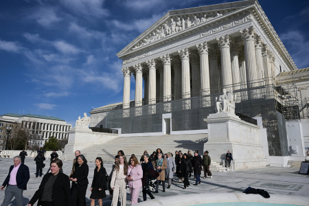 Becky Pepper-Jackson (lower center L), the West Virginia high school sophomore at the center of the Supreme Court appeal on trans-identified male athletes competing in girls' sports, walks with her legal team and supporters outside the U.S. Supreme Court after justices heard arguments in challenges to state bans on trans athletes in women's sports on Jan. 13, 2026, in Washington, D.C. The US Supreme Court on January 13 wades into the hot-button issue of transgender athletes in girls' and women's sports. The court heard challenges to state laws in Idaho and West Virginia banning trans athletes from female-only competitions. More than two dozen U.S. states have passed laws in recent years barring male athletes from taking part in girls' or women's sports. 