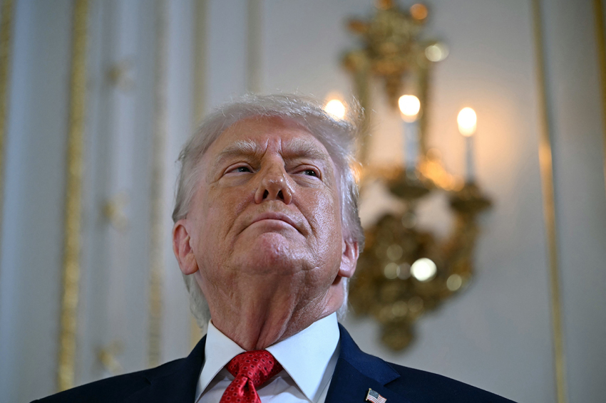 U.S. President Donald Trump arrives to take part in a dedication ceremony for Southern Boulevard, in the ballroom at Mar-a-Lago in Palm Beach, Florida, on Jan. 16, 2026.