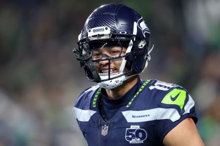 Jaxon Smith-Njigba #11 of the Seattle Seahawks looks on during the third quarter against the Los Angeles Rams in the NFC Championship game at Lumen Field on January 25, 2026, in Seattle, Washington.