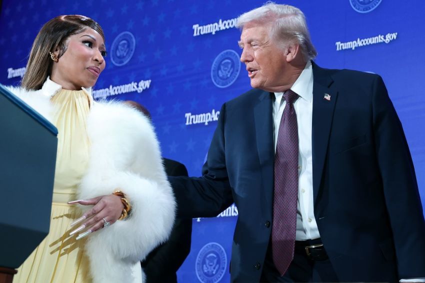 Rapper Nicki Minaj (L) joins U.S. President Donald Trump on stage during the Treasury Department's Trump Accounts Summit at Andrew W. Mellon Auditorium on Jan. 28, 2026, in Washington, D.C.