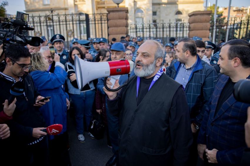 Protest leader Archbishop Bagrat Galstanyan addresses the crowd with a megaphone during a demonstration in Yerevan, Armenia, on October 25, 2024. Civil unrest continues with protests in Yerevan, Armenia, since the attack launched by Azerbaijan on the Armenian population in Artsakh (Nagorno Karabakh) on September 19th, with no clear sign of letting up; citizens are mentally and physically exhausted.