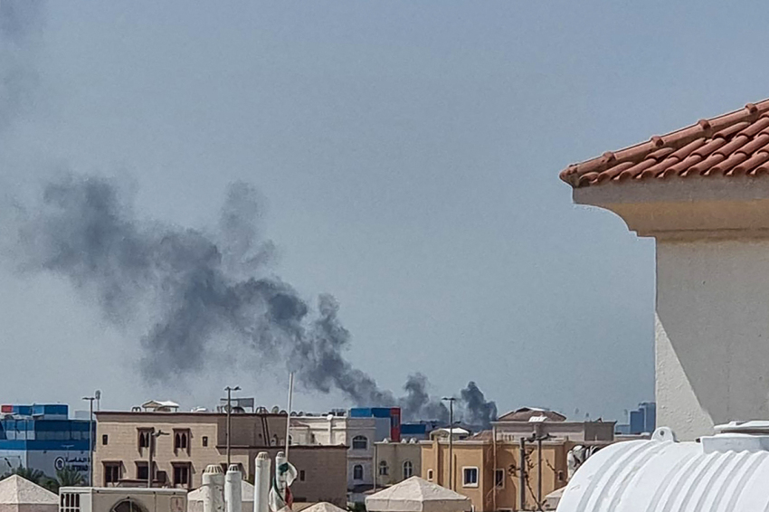 A smoke plume rises over Abu Dhabi from the site of an Iranian missile strike on Feb. 28, 2026. Iranian missiles hit capital cities around the wealthy Gulf on Feb. 28, killing at least one, in retaliation for a U.S. and Israeli attack that threatened to spark a wider conflict. One civilian died in Abu Dhabi, capital of the United Arab Emirates, after being struck by falling debris, according to the Ministry of Defense.