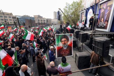 Demonstrators gather with Iranian national flags for a rally in support of the new Supreme Leader at Enghelab Square in central Tehran, March 9, 2026.